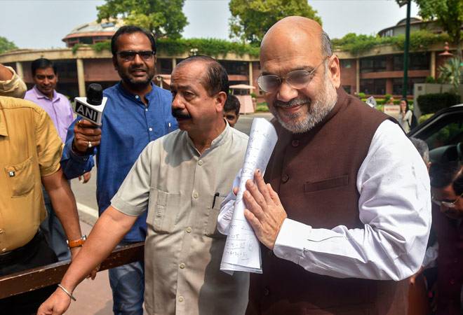 Union Home Minister Amit Shah proposed to revoke Article 370. Photo credit: PTI Union Home Minister Amit Shah proposed to revoke Article 370. Photo credit: PTI