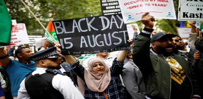 In London, protesters carried banners saying "Kashmir is Burning", "Free Kashmir" and "Modi: Make Tea Not War". Photo: Reuters In London, protesters carried banners saying "Kashmir is Burning", "Free Kashmir" and "Modi: Make Tea Not War". Photo: Reuters