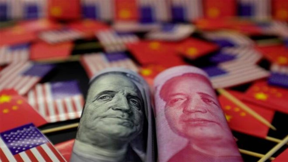 The increasingly bitter trade war between the world's two largest economies sharply escalated on Friday, with both sides levelling more tariffs on each other's exports. The increasingly bitter trade war between the world's two largest economies sharply escalated on Friday, with both sides levelling more tariffs on each other's exports.