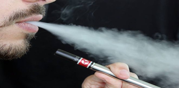 E-cigarettes are nicotine-delivery devices that aerosolise nicotine and flavour chemicals through heating. E-cigarettes are nicotine-delivery devices that aerosolise nicotine and flavour chemicals through heating.