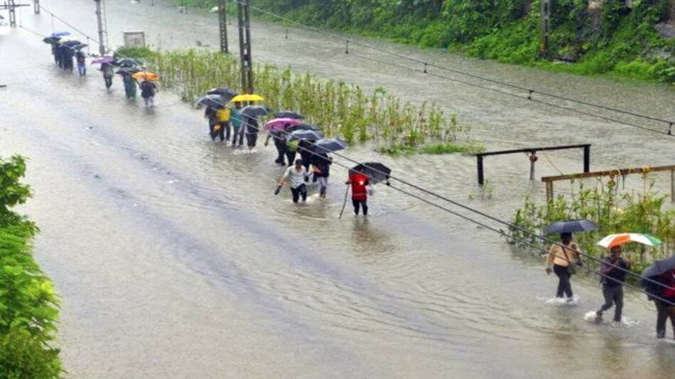 Mumbai rains Live Updates: A lull in the rains offered respite to Mumbai on Thursday with train and road traffic returning to normal. Mumbai rains Live Updates: A lull in the rains offered respite to Mumbai on Thursday with train and road traffic returning to normal.