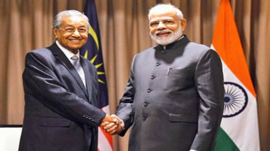 PM Narendra Modi met with Malaysian PM Mahathir Mohamad on the margins of EEF 2019 in Vladivostok. PM Narendra Modi met with Malaysian PM Mahathir Mohamad on the margins of EEF 2019 in Vladivostok.