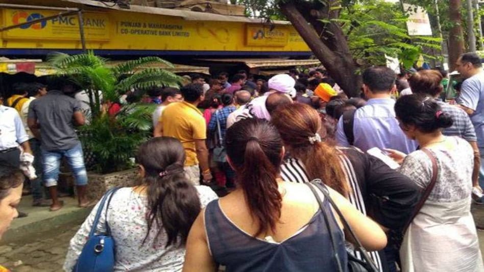 The Reserve Bank of India (RBI) Tuesday cracked its whip on Mumbai-based Punjab and Maharashtra Cooperative (PMC) Bank placing several restrictions on it for six months. The Reserve Bank of India (RBI) Tuesday cracked its whip on Mumbai-based Punjab and Maharashtra Cooperative (PMC) Bank placing several restrictions on it for six months.