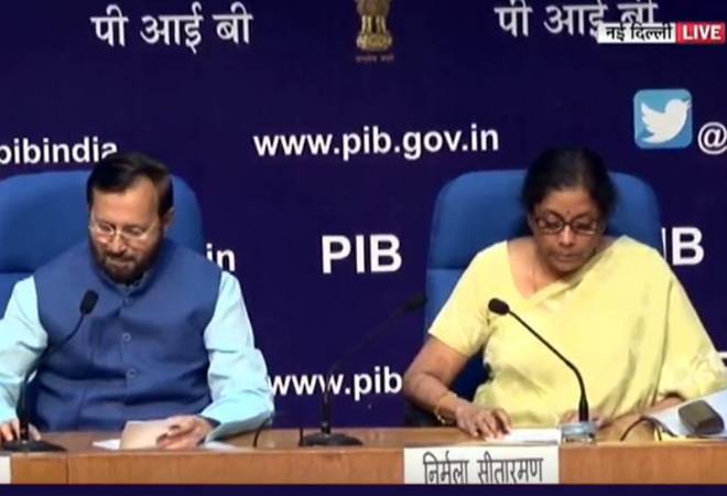 Union Finance Minister Nirmala Sitharaman and HRD Minister Prakash Javadekar during a press conference on Wednesday. Union Finance Minister Nirmala Sitharaman and HRD Minister Prakash Javadekar during a press conference on Wednesday.