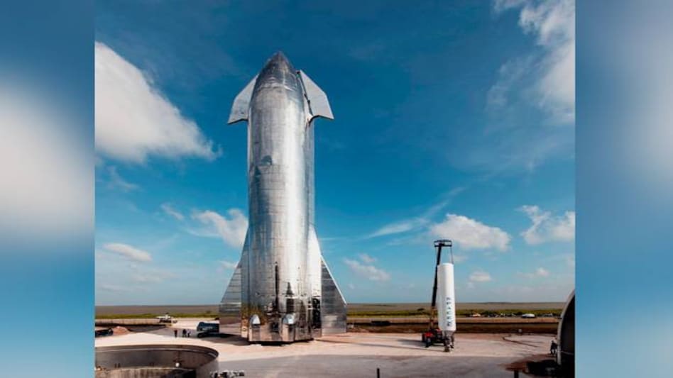 Elon Musk showed a crowd of space enthusiasts and reporters at SpaceX's rocket development site late on Saturday in the remote village of Boca Chica, Texas. Elon Musk showed a crowd of space enthusiasts and reporters at SpaceX's rocket development site late on Saturday in the remote village of Boca Chica, Texas.