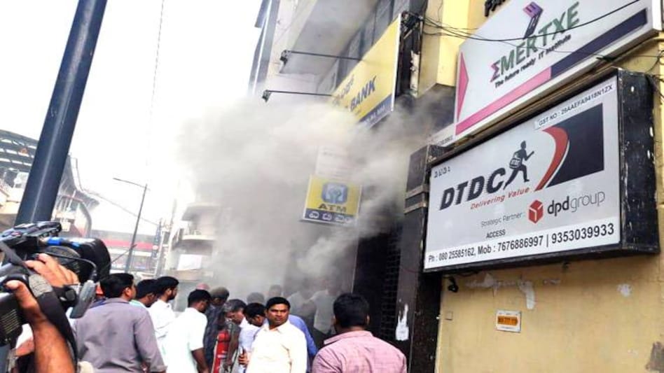 Fire at a UCO Bank branch in Bengaluru. Photo credit: ANI Fire at a UCO Bank branch in Bengaluru. Photo credit: ANI