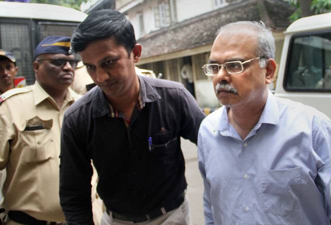 Suspended PMC Bank MD Joy Thomas (right) being produced before a court in relation to the PMC Bank scam. Photo credit: PTI Suspended PMC Bank MD Joy Thomas (right) being produced before a court in relation to the PMC Bank scam. Photo credit: PTI