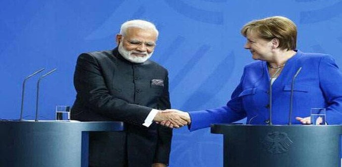 File photo of Narendra Modi with Germany Chancellor Angela Merkel File photo of Narendra Modi with Germany Chancellor Angela Merkel