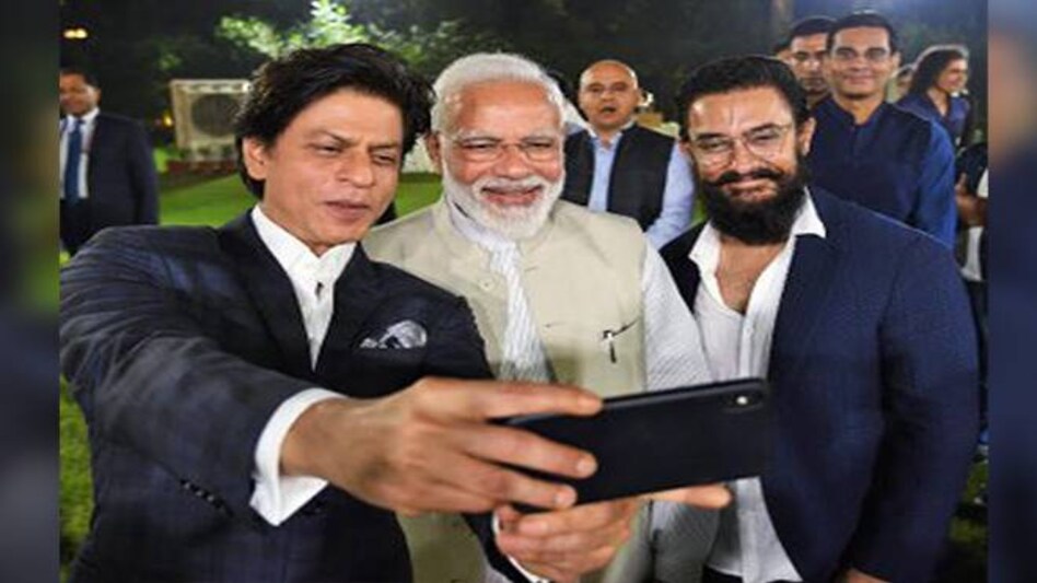 PM Modi with Shah Rukh Khan, Aamir Khan at his residence on Saturday PM Modi with Shah Rukh Khan, Aamir Khan at his residence on Saturday