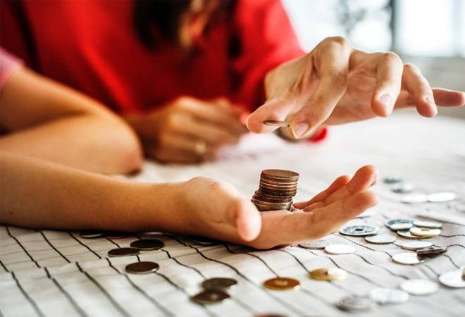 Children's Day: Empower your child with the right values, both about life and money Children's Day: Empower your child with the right values, both about life and money