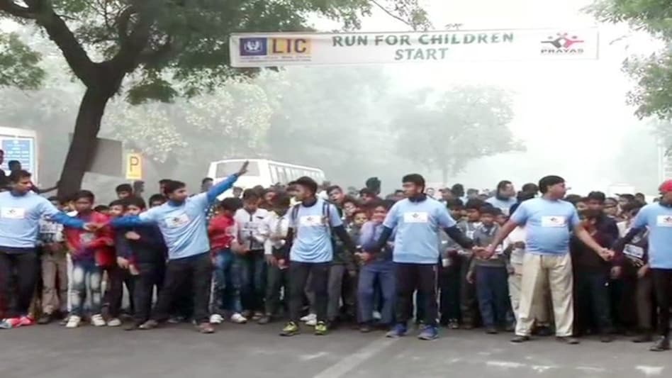 Children wait for the marathon to begin (Photo credit: ANI) Children wait for the marathon to begin (Photo credit: ANI)