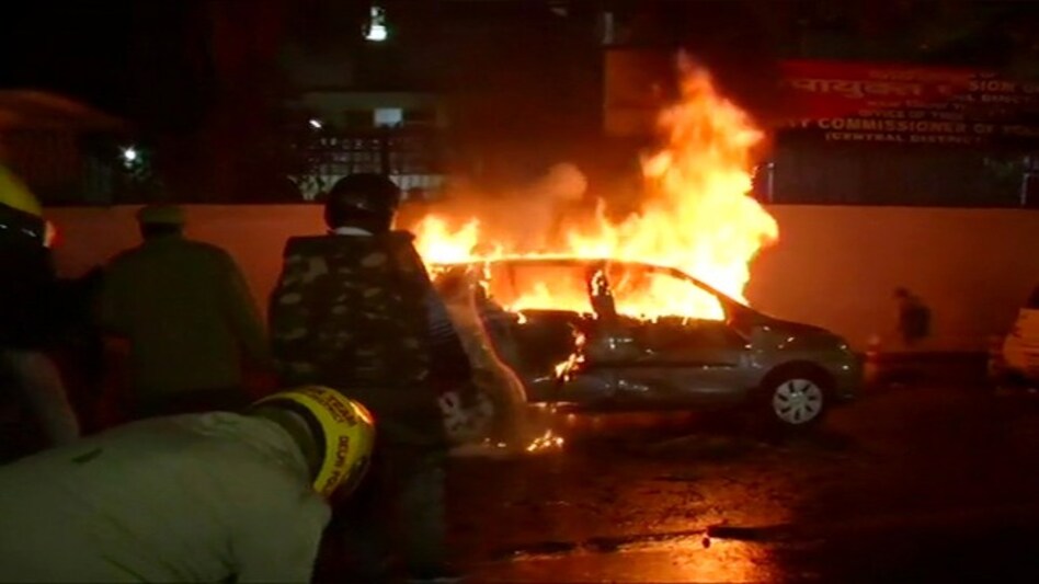 Citizenship Act protests: Car burnt in Delhi's Daryaganj region (Photo credit: ANI/ Twitter) Citizenship Act protests: Car burnt in Delhi's Daryaganj region (Photo credit: ANI/ Twitter)