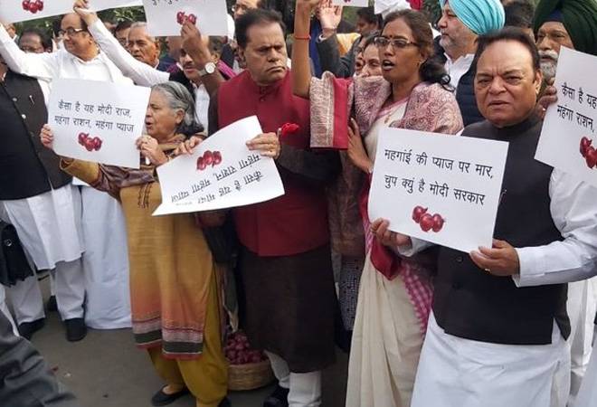 Congress leaders, including P Chidambaram protest in Parliament premises over onion prices (Photo: ANI) Congress leaders, including P Chidambaram protest in Parliament premises over onion prices (Photo: ANI)