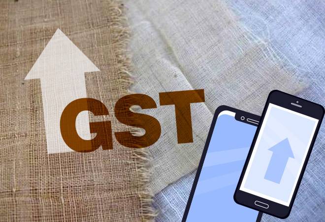 The current GST rate on mobile phones is 12%, while phone parts and batteries attract an 18% tax rate, causing an inverted tax structure. Meanwhile, there is a 5% GST rate on fabric The current GST rate on mobile phones is 12%, while phone parts and batteries attract an 18% tax rate, causing an inverted tax structure. Meanwhile, there is a 5% GST rate on fabric