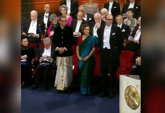 Economists Abhijit Banerjee, his wife Esther Duflo and Michael Kremer during the award ceremony in Sweden Economists Abhijit Banerjee, his wife Esther Duflo and Michael Kremer during the award ceremony in Sweden