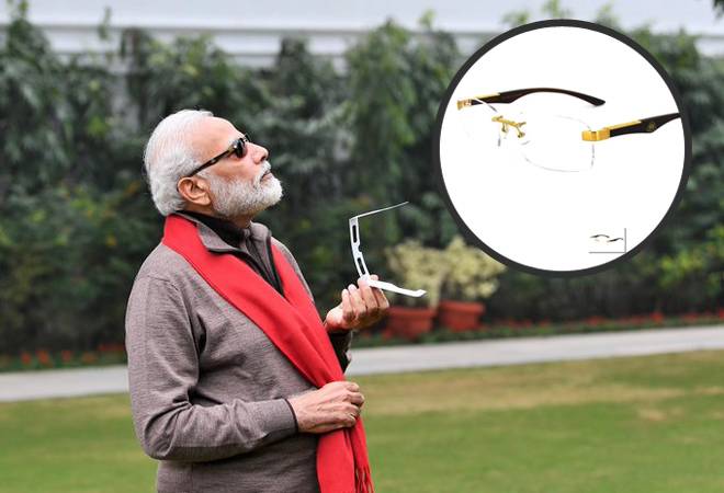 Solar Eclipse 2019: PM Modi shared pictures of him trying to catch a glimpse Solar Eclipse 2019: PM Modi shared pictures of him trying to catch a glimpse