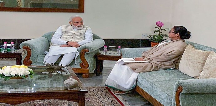 PM Narendra Modi met West Bengal CM Mamata Banerjee during her two-day visit to Kolkata (Photo credit: PTI) PM Narendra Modi met West Bengal CM Mamata Banerjee during her two-day visit to Kolkata (Photo credit: PTI)