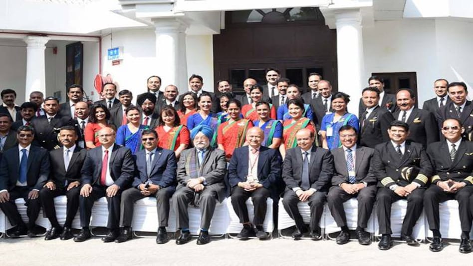 Air India staff with Civil Aviation Minister Hardeep Singh Puri Air India staff with Civil Aviation Minister Hardeep Singh Puri