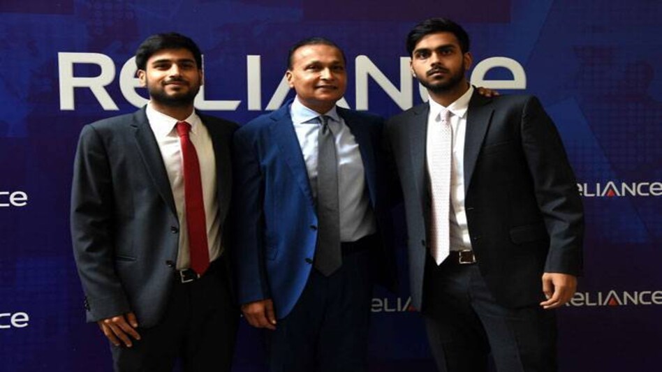 Anil Ambani (centre), with his sons Anmol and Anshul during the company's AGM on September 30. Photo credit: IANS Anil Ambani (centre), with his sons Anmol and Anshul during the company's AGM on September 30. Photo credit: IANS