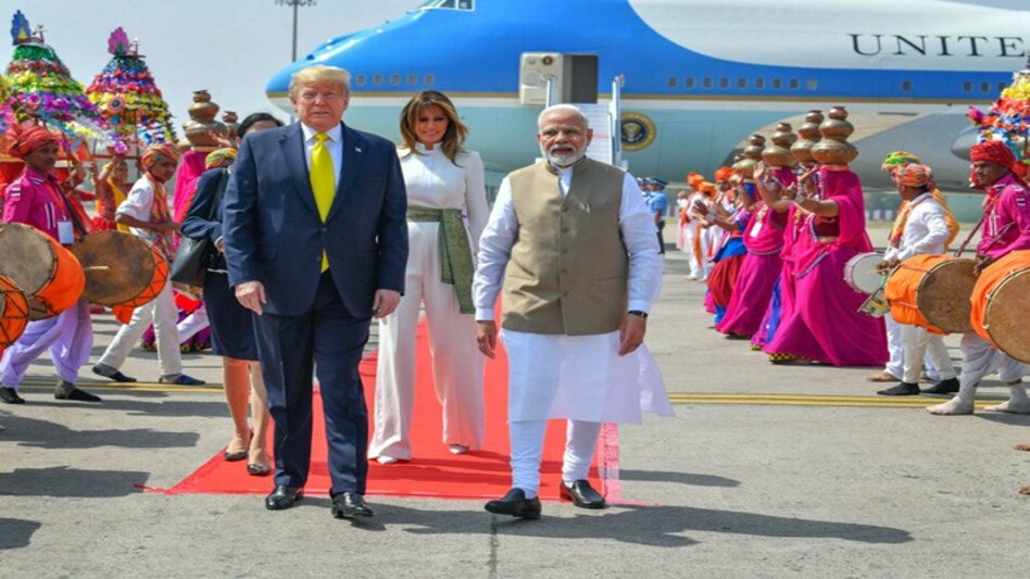 PM Narendra Modi receives US President Donald Trump at Ahmedabad airport (Photo credit: PTI) PM Narendra Modi receives US President Donald Trump at Ahmedabad airport (Photo credit: PTI)