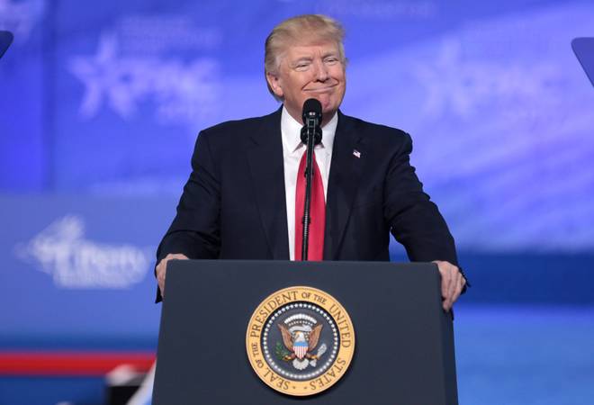 Donald Trump is expected to get a roaring welcome by lakhs of people when he arrives in Ahmedabad Donald Trump is expected to get a roaring welcome by lakhs of people when he arrives in Ahmedabad