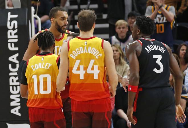 Utah Jazz center Rudy Gobert, rear, is separated from Toronto Raptors forward OG Anunoby in the second half of an NBA basketball game, Monday, March 9, 2020, in Salt Lake City. (Image Source:AP) Utah Jazz center Rudy Gobert, rear, is separated from Toronto Raptors forward OG Anunoby in the second half of an NBA basketball game, Monday, March 9, 2020, in Salt Lake City. (Image Source:AP)