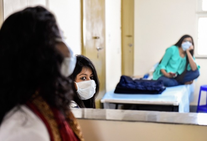 Coronavirus outbreak: Evacuees at ITBP quarantine faciltiy in Chhawla (Photo credit: PTI) Coronavirus outbreak: Evacuees at ITBP quarantine faciltiy in Chhawla (Photo credit: PTI)
