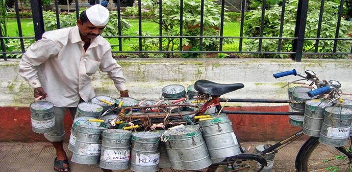 The dabbawalas feed almost 200,000 Mumbaikars with home-cooked food The dabbawalas feed almost 200,000 Mumbaikars with home-cooked food