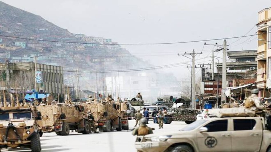 Afghan forces surround the gurudwara site (Credits - Reuters) Afghan forces surround the gurudwara site (Credits - Reuters)