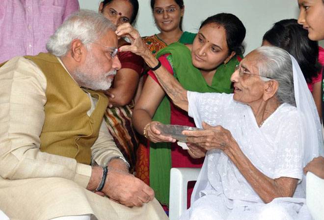 Prime Minister Narendra Modi with his mother Heeraben Modi Prime Minister Narendra Modi with his mother Heeraben Modi