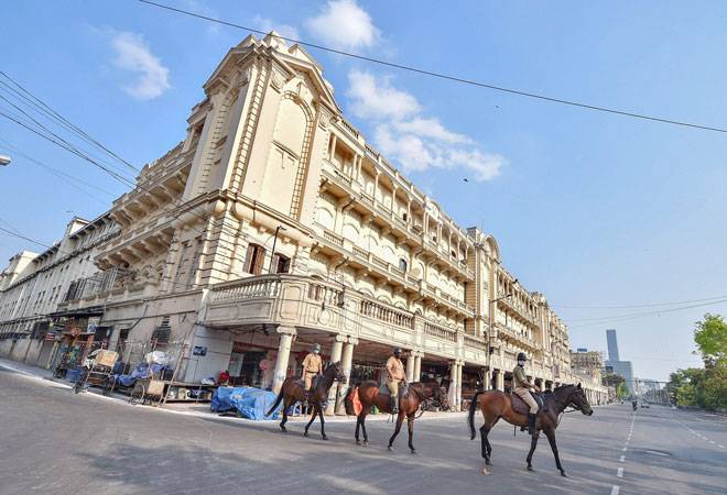 Coronavirus in India updates 14 Apr 2020, lockdown: Police personeel patrol empty streets in Kolkata amid lockdown (Photo credit: PTI) Coronavirus in India updates 14 Apr 2020, lockdown: Police personeel patrol empty streets in Kolkata amid lockdown (Photo credit: PTI)