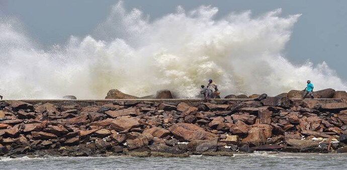 Turbulent waves crash into the coast Kasimedu Fishing Harbour, ahead of landfall by Cyclone Amphan, in Chennai. (Photo: PTI) Turbulent waves crash into the coast Kasimedu Fishing Harbour, ahead of landfall by Cyclone Amphan, in Chennai. (Photo: PTI)