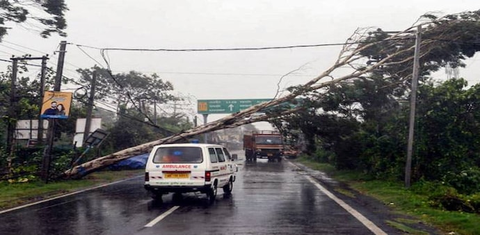 Cyclone Amphan updates: A tree falls on power lines during strong winds due to Cyclone Amphan at Kakdwip near Sunderbans in West Bengal. Cyclone Amphan updates: A tree falls on power lines during strong winds due to Cyclone Amphan at Kakdwip near Sunderbans in West Bengal.