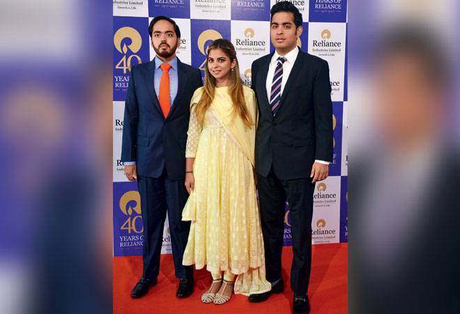 Anant Ambani, Isha Ambani and Akash Ambani at the company's 40th Annual General Meeting in Mumbai - Photograph by Milind Shelte Anant Ambani, Isha Ambani and Akash Ambani at the company's 40th Annual General Meeting in Mumbai - Photograph by Milind Shelte