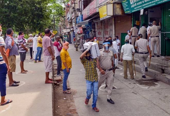 Coronavirus lockdown 3.0: Delhi Police lathicharge as people flock to liquor shops