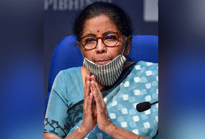 Union Finance Minister Nirmala Sitharaman wearing a face mask gestures as she announces the governments economic package to fight the coronavirus pandemic Union Finance Minister Nirmala Sitharaman wearing a face mask gestures as she announces the governments economic package to fight the coronavirus pandemic