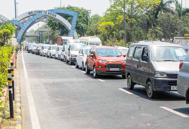 Traffic jam on Noida- Delhi road during the nationwide COVID-19 lockdown. (Photo: PTI) Traffic jam on Noida- Delhi road during the nationwide COVID-19 lockdown. (Photo: PTI)