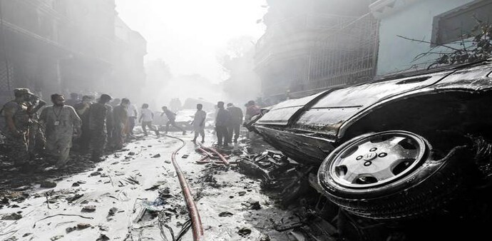 Pakistan plane crash (Image: Reuters) Pakistan plane crash (Image: Reuters)