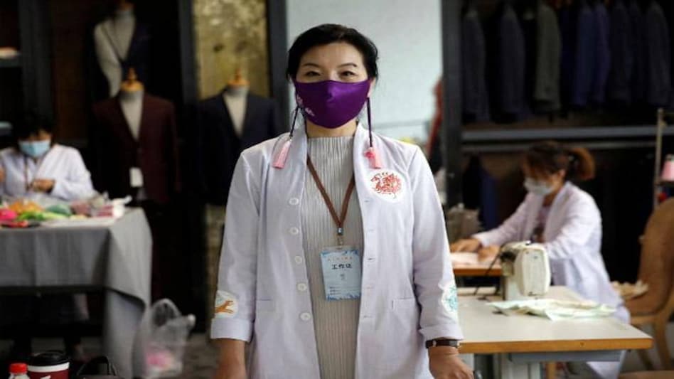 Coronavirus in China: Designer Zhou Li makes silk COVID-19 masks Coronavirus in China: Designer Zhou Li makes silk COVID-19 masks