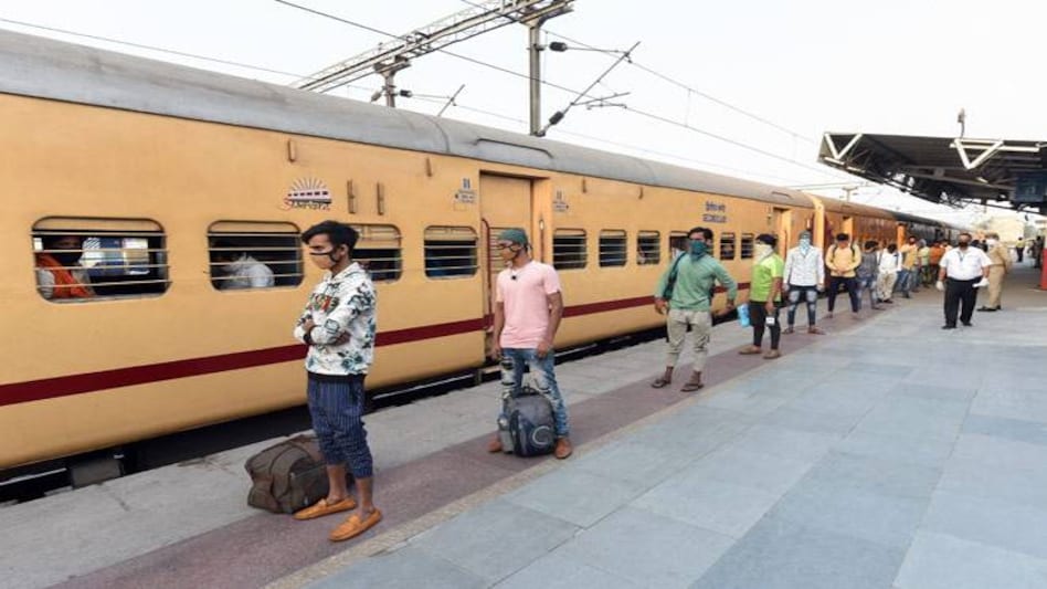 Migrants who have arrived from Nashik follow social distancing while deboarding a train at Charbagh railway station in Lucknow Migrants who have arrived from Nashik follow social distancing while deboarding a train at Charbagh railway station in Lucknow