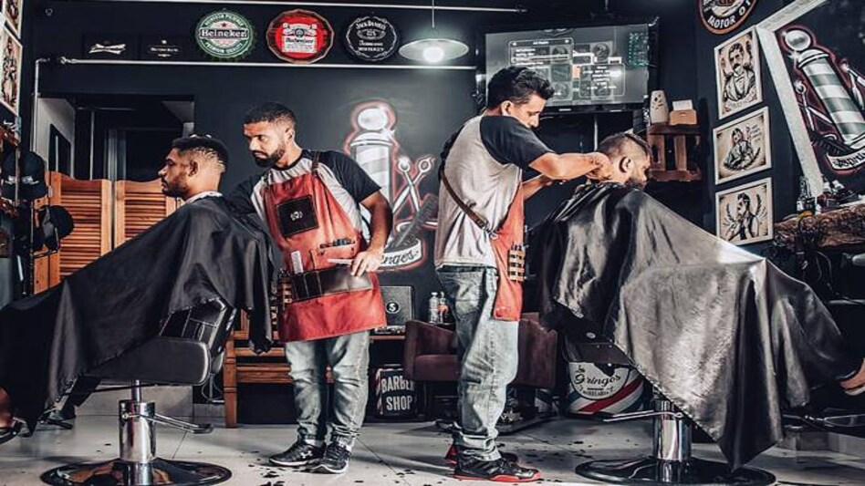 The government has mandated staff to wear protective gear, including gloves, aprons, and masks The government has mandated staff to wear protective gear, including gloves, aprons, and masks