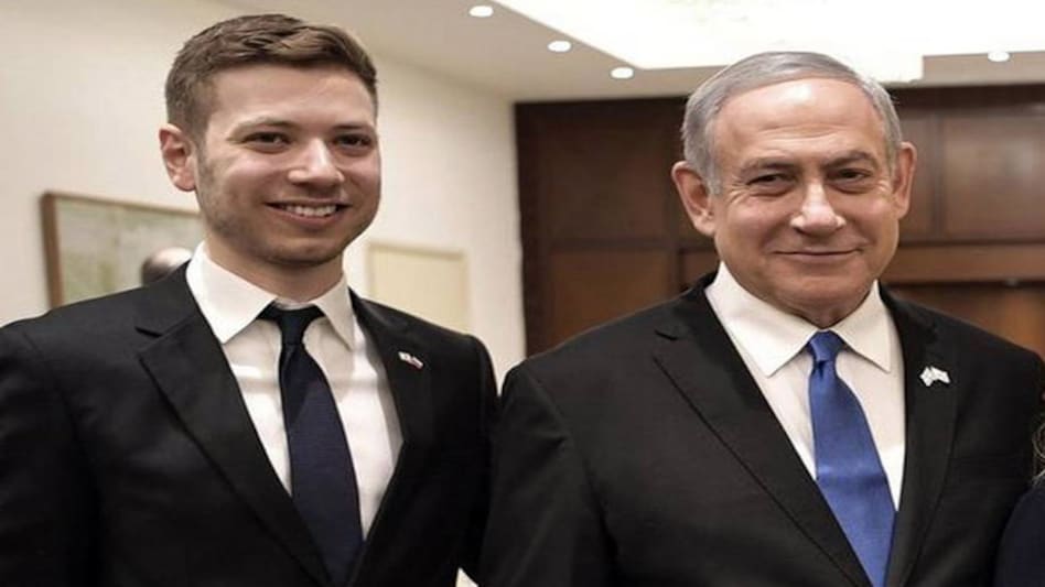Israeli Prime Minister Benjamin Netanyahu with his eldest son Yair Israeli Prime Minister Benjamin Netanyahu with his eldest son Yair