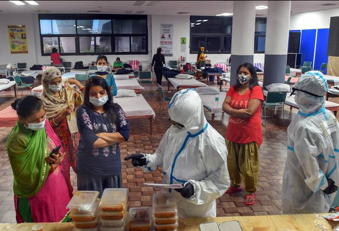 Patients collect breakfast at CWG village COVID-19 Care Centre Patients collect breakfast at CWG village COVID-19 Care Centre