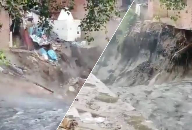 Delhi rains: Road caves in near ITO after downpour; nearby house collapses