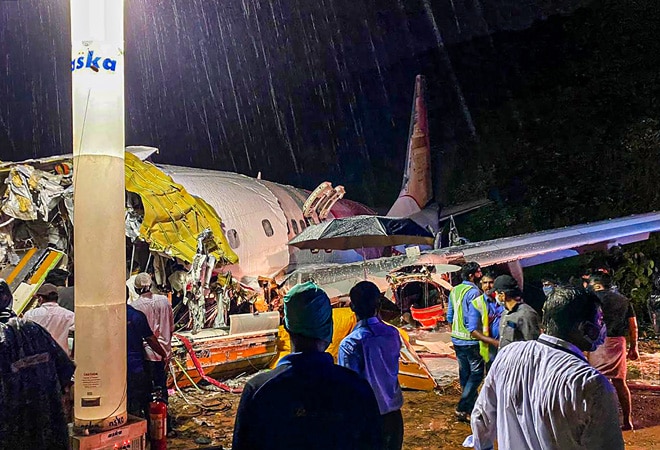 Rescue operation underway after an Air India Express flight with passengers on board en route from Dubai skidded off the runway while landing, at Karippur in Kozhikode. Rescue operation underway after an Air India Express flight with passengers on board en route from Dubai skidded off the runway while landing, at Karippur in Kozhikode.