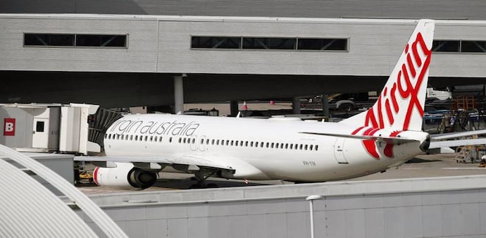 Virgin's board selected Bain as the winning bidder in late June of an auction that followed the airline's entry into voluntary administration in April Virgin's board selected Bain as the winning bidder in late June of an auction that followed the airline's entry into voluntary administration in April