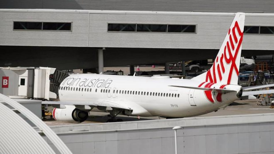 Debt-ridden Virgin Australia to cut one-third workforce, focus on short haul Debt-ridden Virgin Australia to cut one-third workforce, focus on short haul