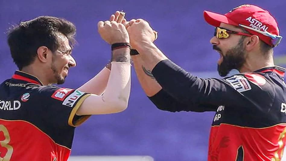 Royal Challengers Bangalore captain Virat Kohli with Yuzvendra Chahal. (Photo Courtesy-BCCI) Royal Challengers Bangalore captain Virat Kohli with Yuzvendra Chahal. (Photo Courtesy-BCCI)