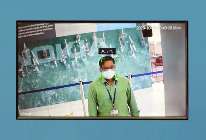 The system detects if a person has a high temperature or is not wearing face-mask The system detects if a person has a high temperature or is not wearing face-mask