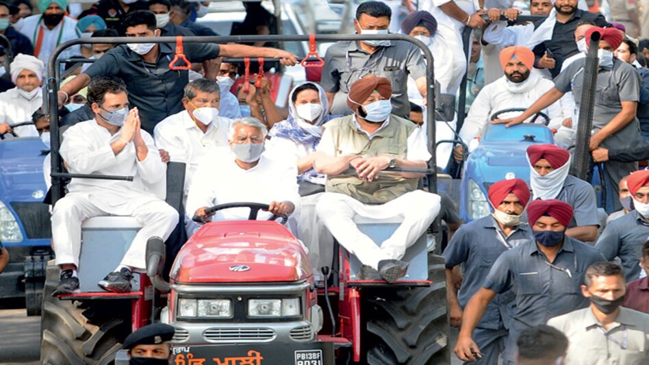 Congress leader Rahul Gandhi with Punjab Chief Minister Amarinder Singh and others during the 'Kheti Bachao' tractor rally against new farm laws in Patiala Congress leader Rahul Gandhi with Punjab Chief Minister Amarinder Singh and others during the 'Kheti Bachao' tractor rally against new farm laws in Patiala